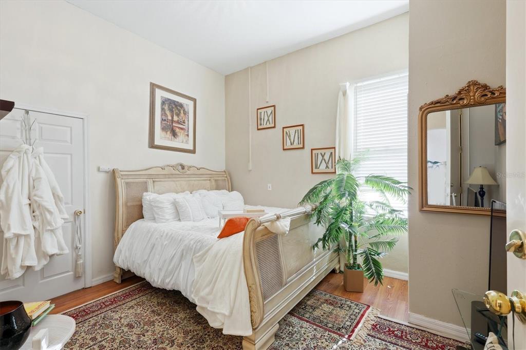 1007 3rd Street East Palmetto, FL 34221 - Photo 23 of 44 a bedroom with a bed and a window