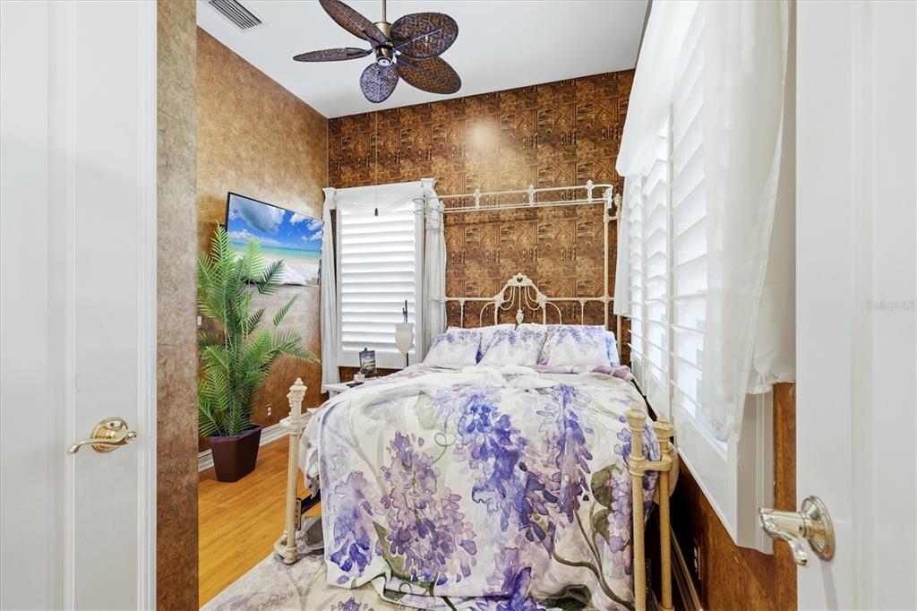 1007 3rd Street East Palmetto, FL 34221 - Photo 27 of 44 a bedroom with a bed and a window