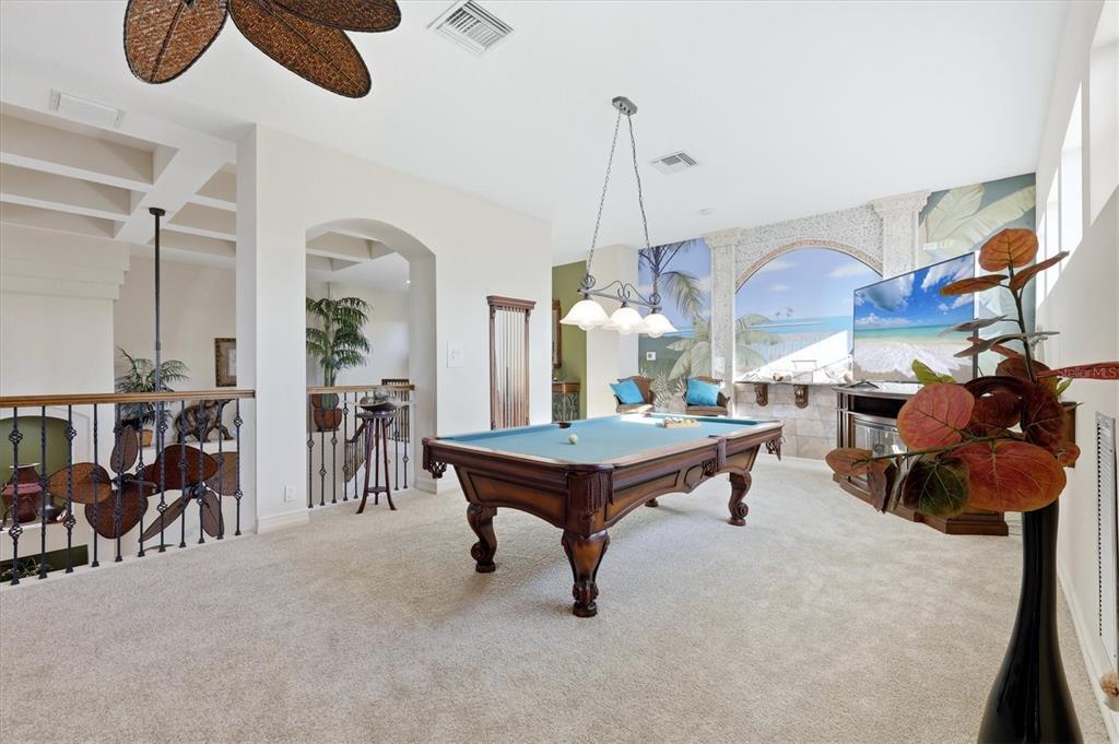 1007 3rd Street East Palmetto, FL 34221 - Photo 29 of 44 a room with lots of furniture and air hockey table