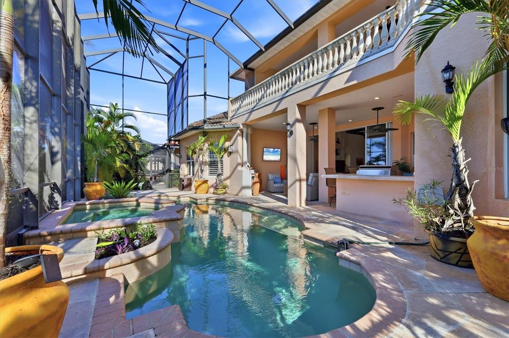 1007 3rd Street East Palmetto, FL 34221 - Photo 39 of 44 a view of a swimming pool with outdoor seating