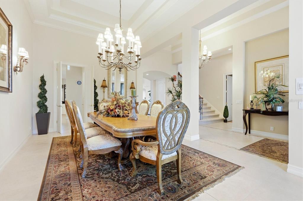 1007 3rd Street East Palmetto, FL 34221 - Photo 9 of 44 a view of a dining room with furniture and chandelier