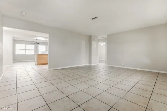 a view of an empty room and window