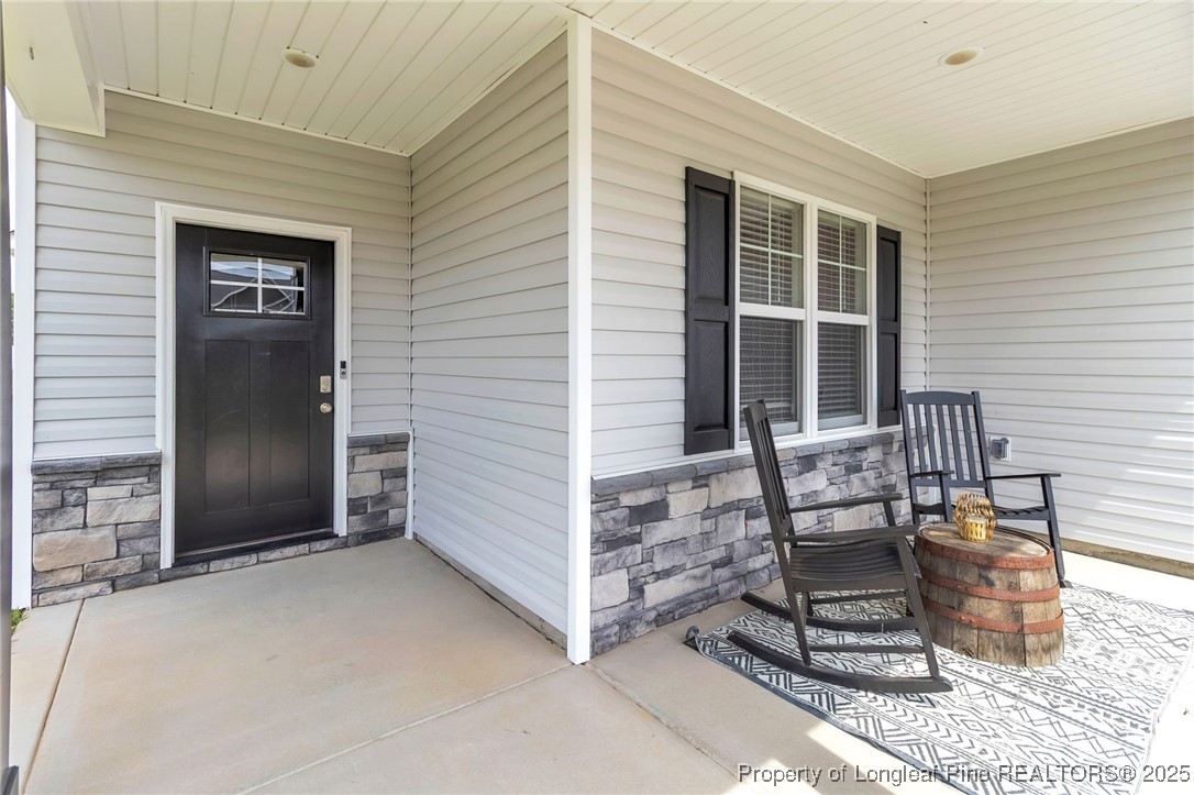 5221 Bree Bridge Road Hope Mills, NC 28348 - Photo 2 of 39 a view of house front with seating space