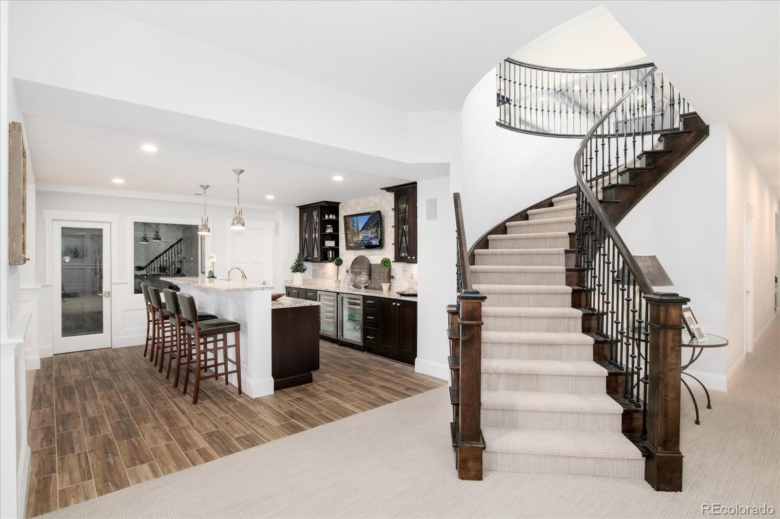 10890 Rainribbon Road Highlands Ranch, CO 80126 - Photo 29 of 40 a view of entryway and kitchen