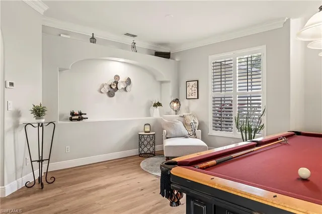 a room with furniture and wooden floor