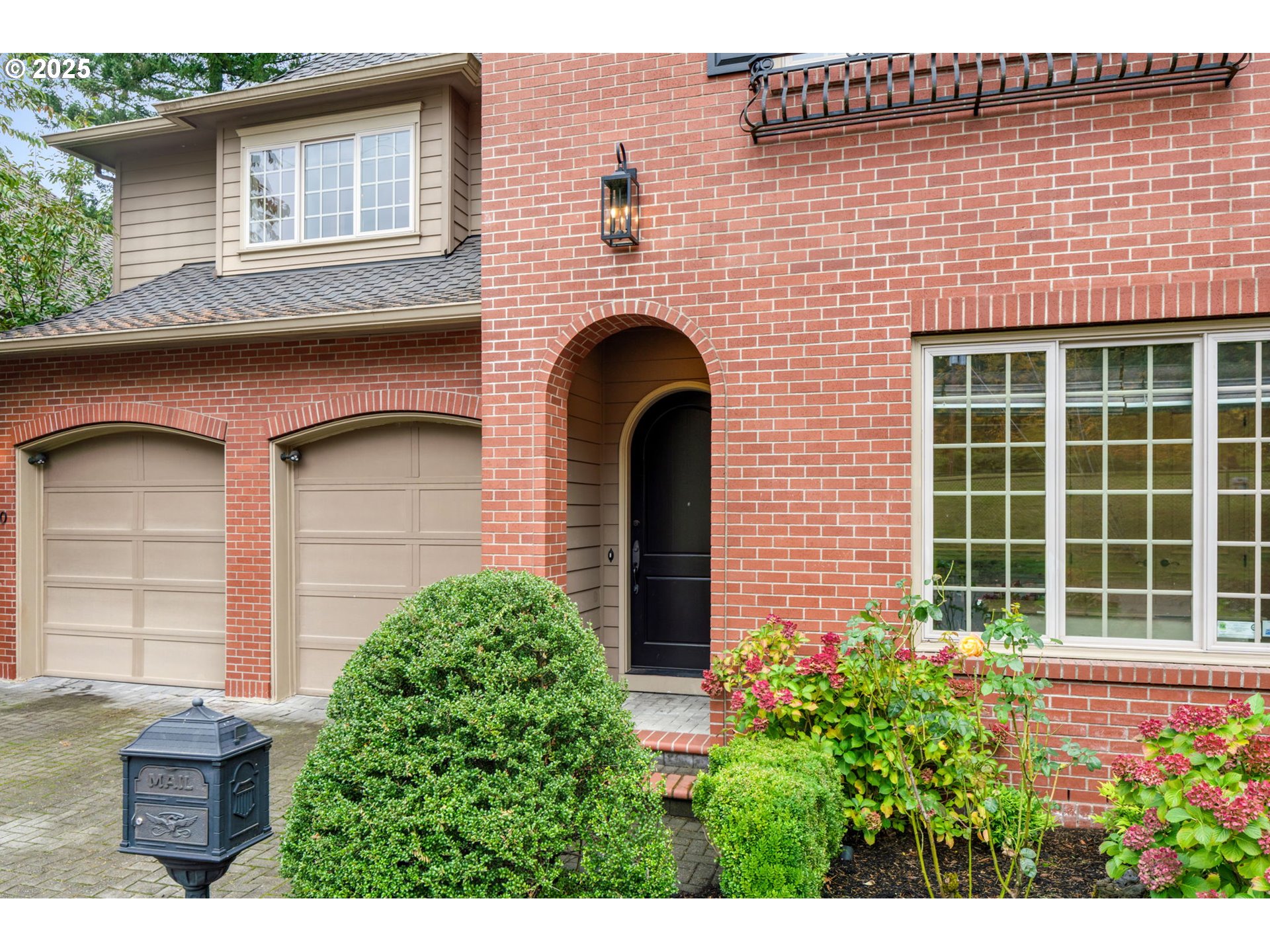 4530 Southwest Council Crest Drive Portland, OR 97239 - Photo 2 of 43 a front view of a house with plants