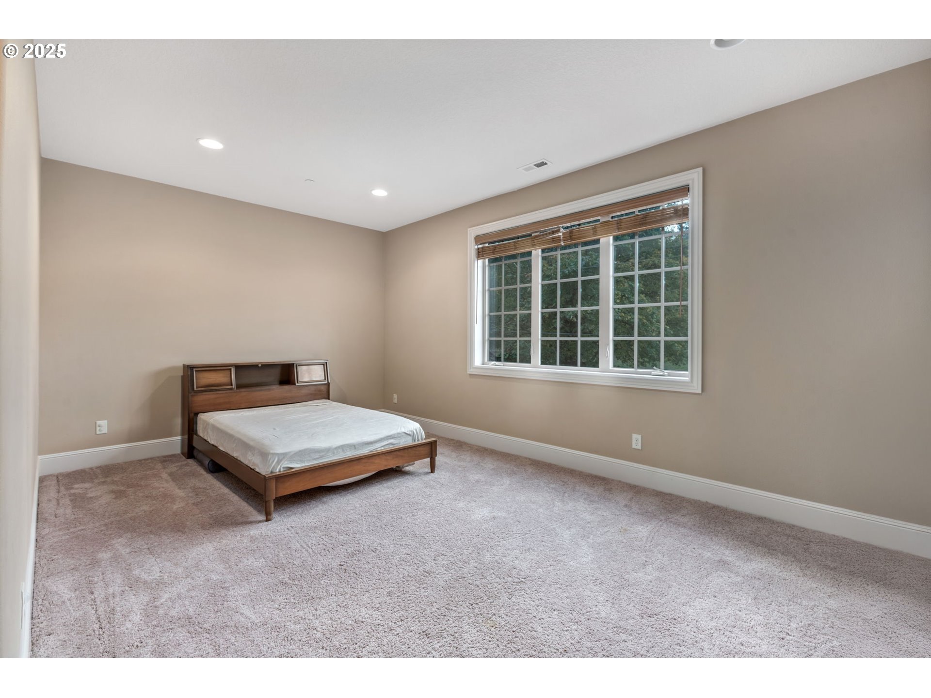 4530 Southwest Council Crest Drive Portland, OR 97239 - Photo 26 of 43 an empty room with windows