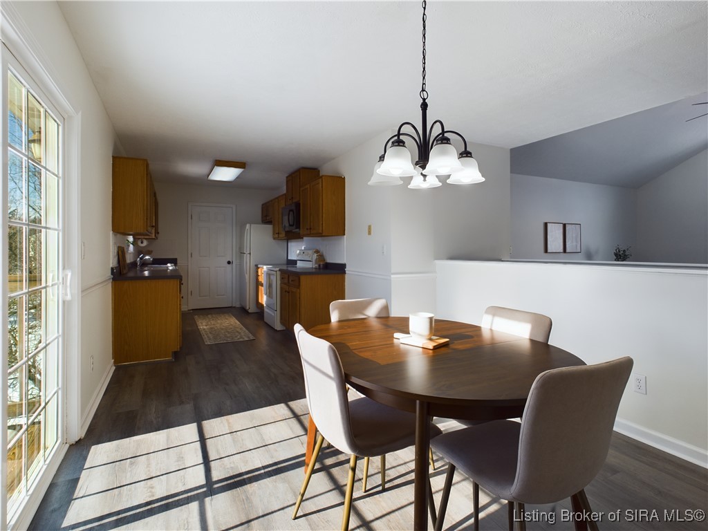 6209 Elanor Court Floyds Knobs, IN 47119 - Photo 5 of 25 A much larger table could easily fit in this space