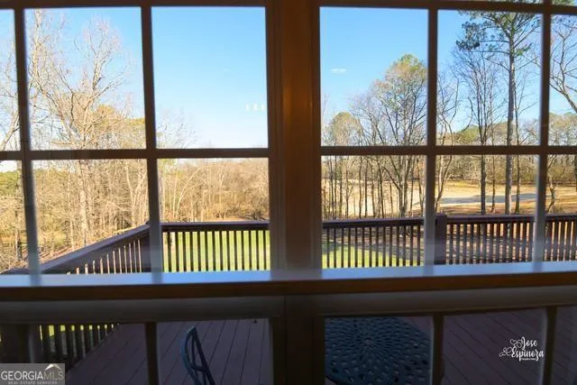 a view of a porch with a bench