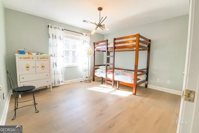 a view of a bedroom with gym equipment