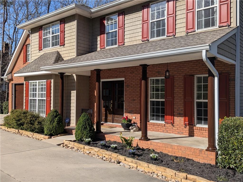 355 Golf View Drive Cohutta, GA 30710 - Photo 2 of 45 front view of a brick house with a large windows