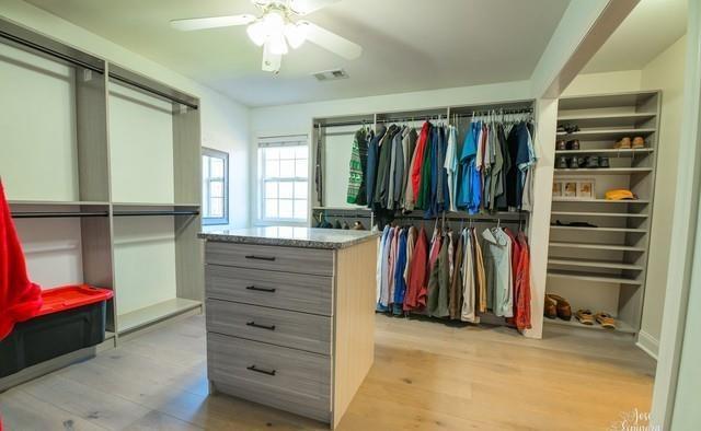 355 Golf View Drive Cohutta, GA 30710 - Photo 24 of 45 a view of walk in closet with clothes and shoes