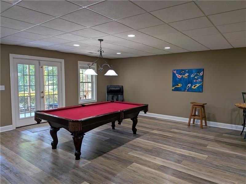 355 Golf View Drive Cohutta, GA 30710 - Photo 28 of 45 a room with pool table windows and wooden floor