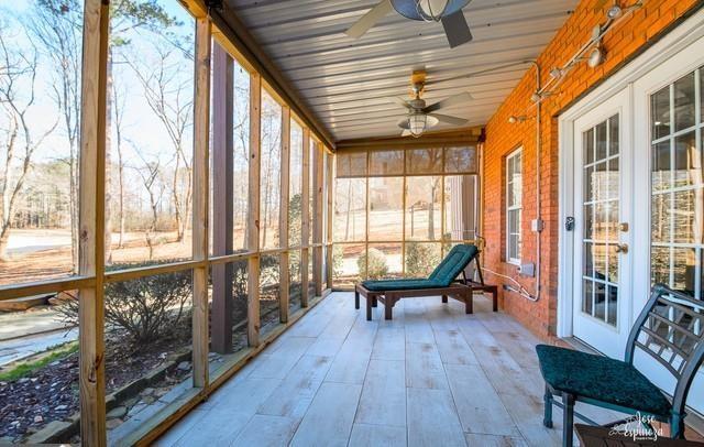 355 Golf View Drive Cohutta, GA 30710 - Photo 32 of 41 a living room filled with furniture and a wooden floor