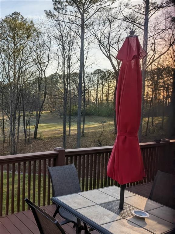 355 Golf View Drive Cohutta, GA 30710 - Photo 35 of 45 a view of balcony with wooden floor and outdoor seating