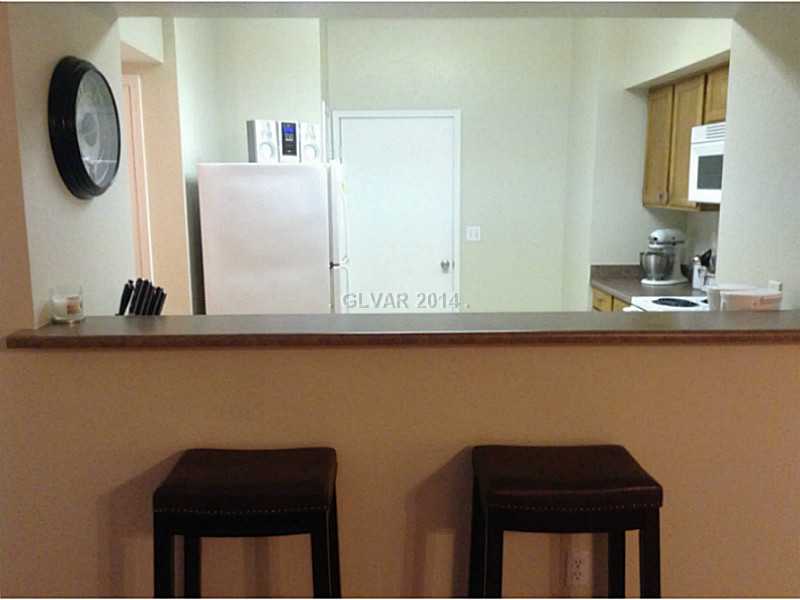 9620 West Russell Road, Unit 1015 Las Vegas, NV 89148 - Photo 6 of 22 Property Photo. BREAKFAST BAR IS ALSO GREAT FOR ENTERTAINING!