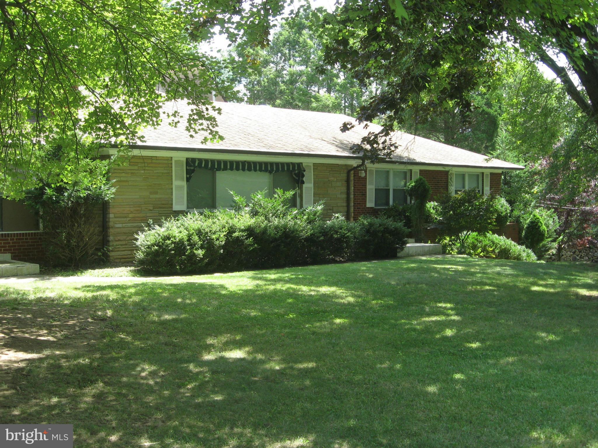 a view of a house with a garden