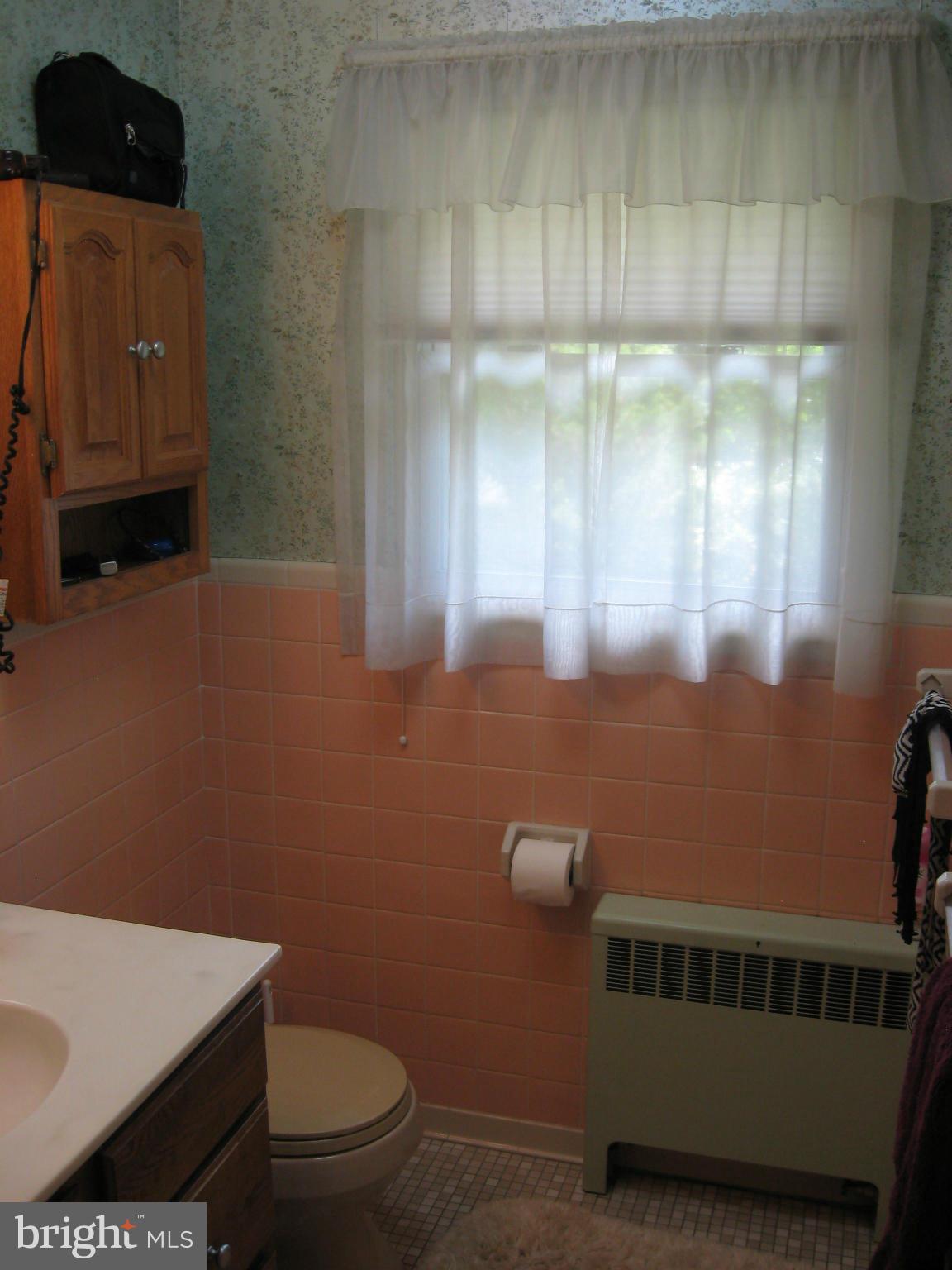 14709 Claude Lane Silver Spring, MD 20905 - Photo 15 of 21 a bathroom with a toilet