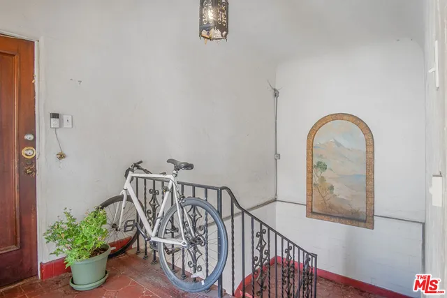 a view of entryway with wooden floor