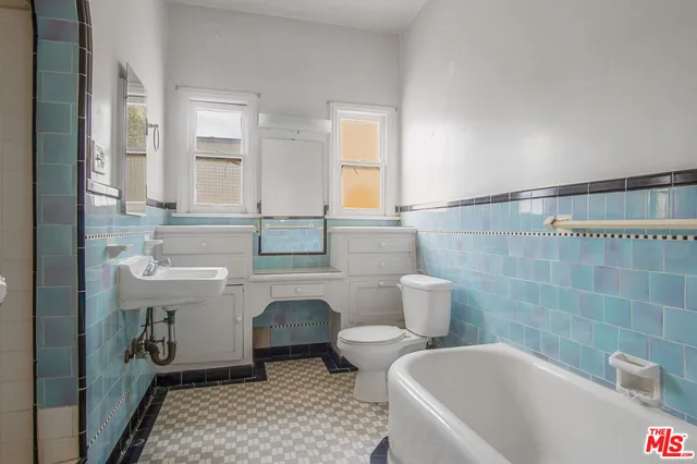 a bathroom with a sink and a bathtub