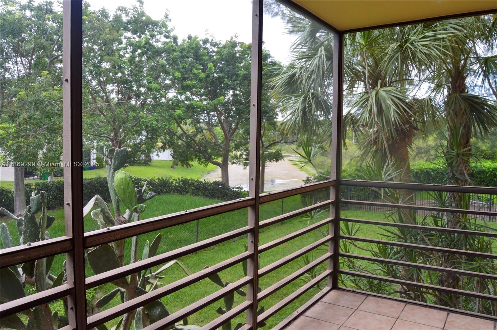 3490 Foxcroft Road, Unit B212 Miramar, FL 33025 - Photo 19 of 21 a view of a green field