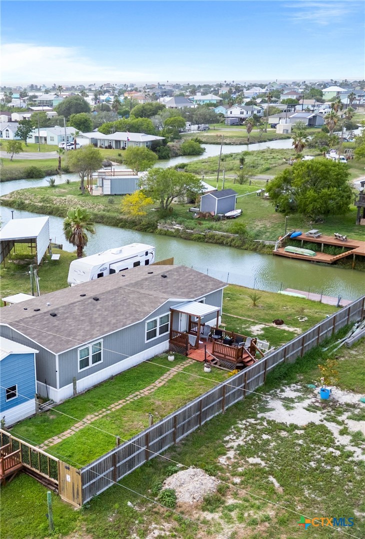 239 Allen M Parks Drive Rockport, TX 78382 - Photo 5 of 29 an aerial view of a house with a garden and lake view
