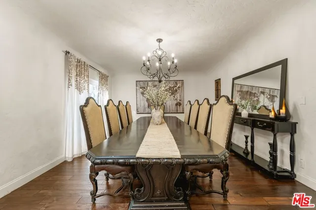 a kitchen with a sink and wooden cabinets
