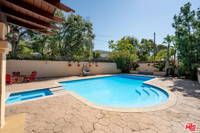a spacious bathroom with a sink and a toilet