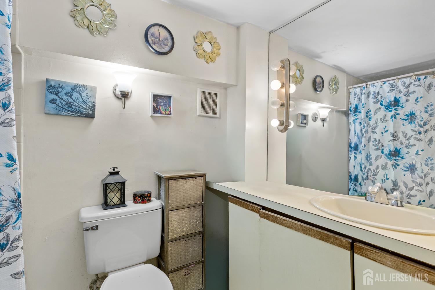 40 Fayette Street, Unit 26 Perth Amboy, NJ 08861 - Photo 16 of 20 a bathroom with a toilet and a shower