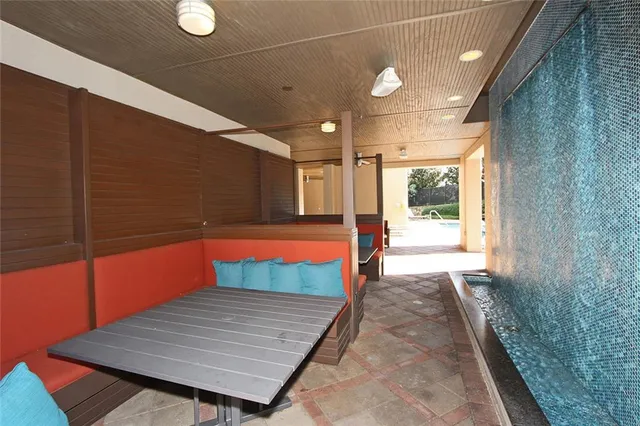 a bathroom with a bathtub and a sink