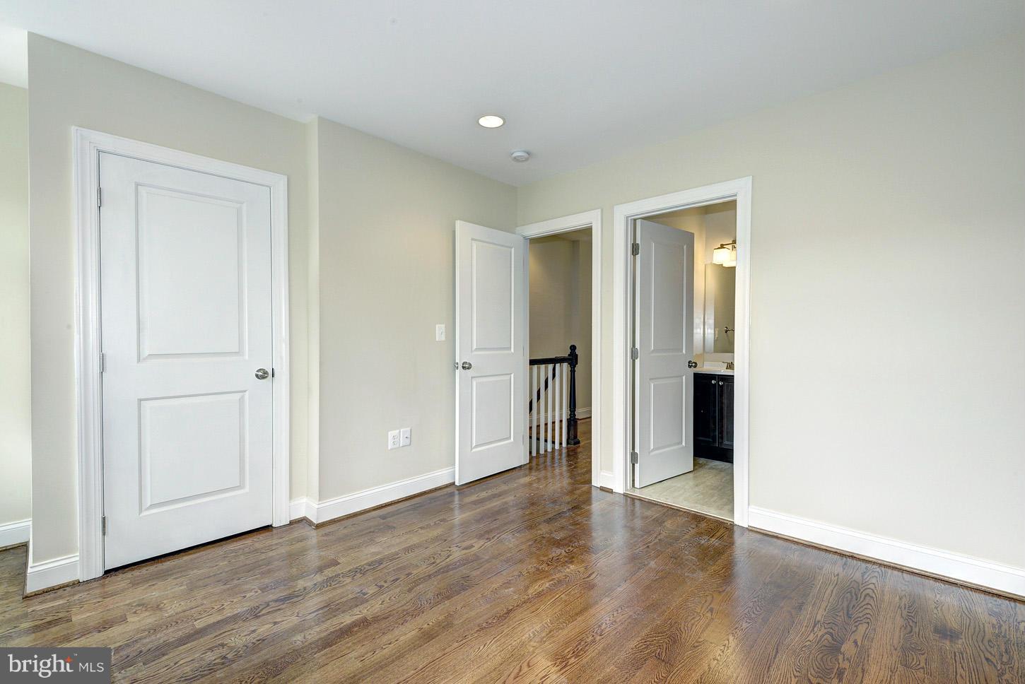 2428 4th Street Northeast Washington, DC 20002 - Photo 11 of 28 an empty room with wooden floor & closet area