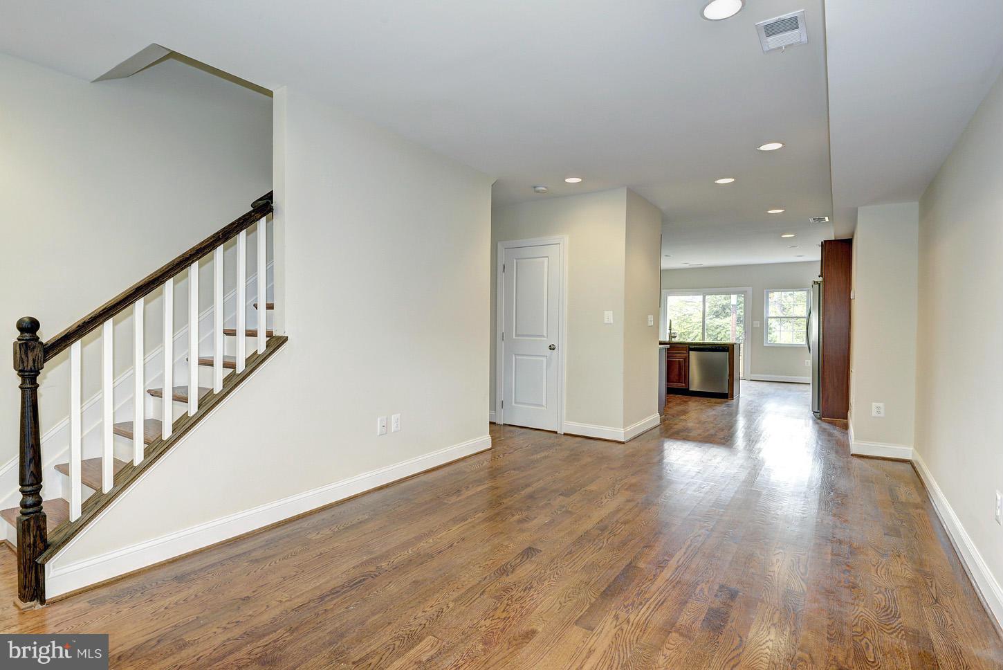 2428 4th Street Northeast Washington, DC 20002 - Photo 4 of 28 a view of interior space with wooden floor and kitchen