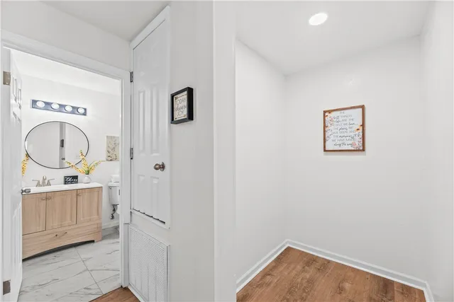a bathroom with a sink a toilet and a bathtub