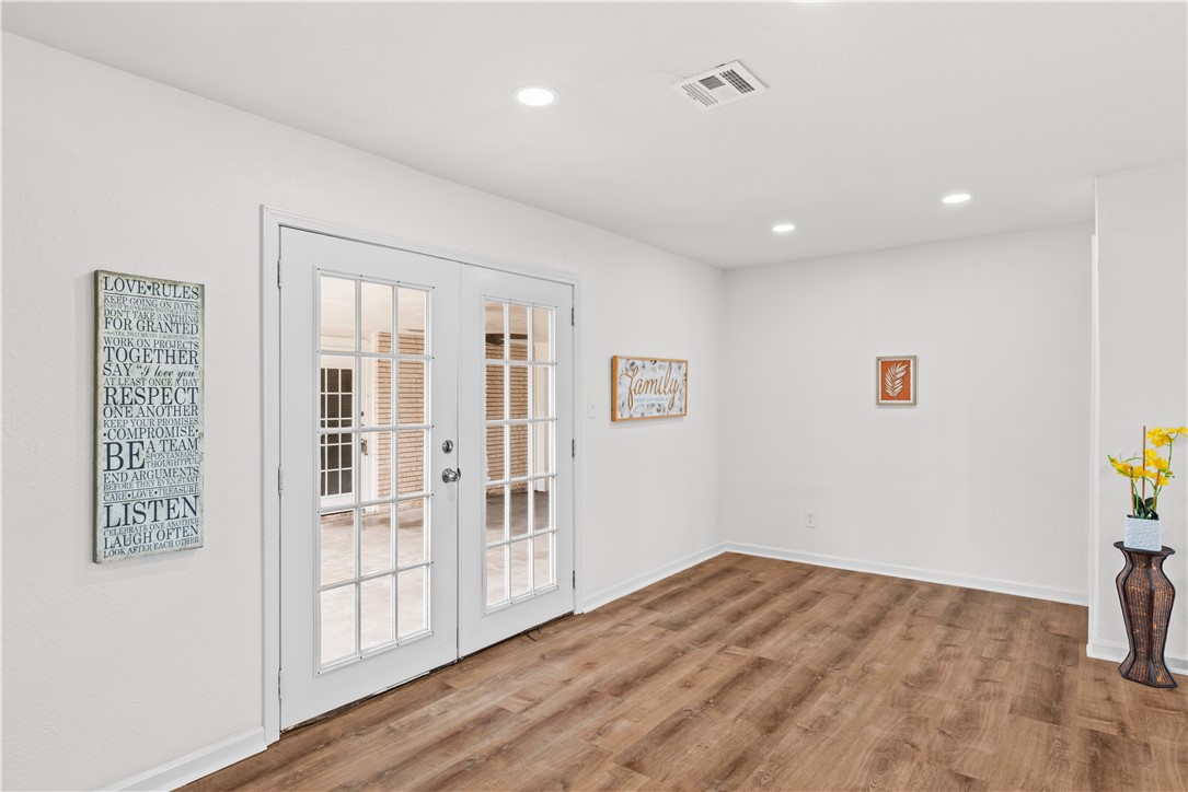 2575 San Angelo Avenue Ingleside, TX 78362 - Photo 25 of 38 a view of empty room with wooden floor