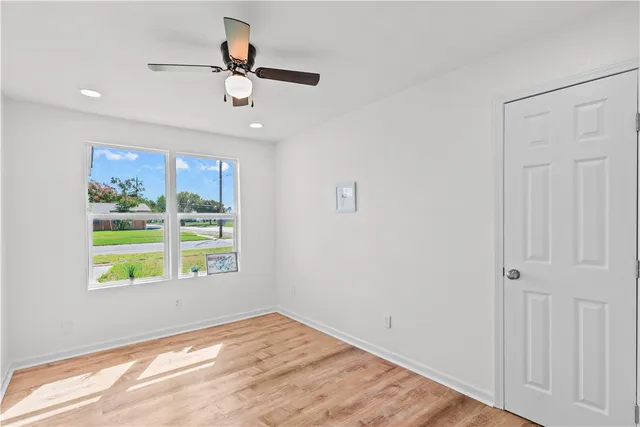 a bathroom with a sink a mirror and vanity