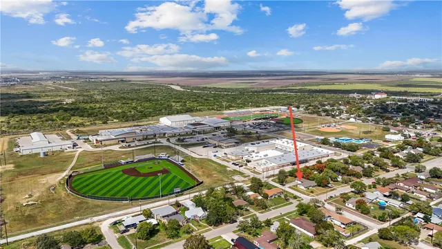 a view of a livingroom with a hardwood floor and a ceiling fan