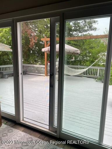 7 Slocum Place Oakhurst, NJ 07755 - Photo 12 of 14 a view of a glass door and a window