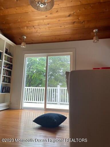 7 Slocum Place Oakhurst, NJ 07755 - Photo 13 of 14 a view of a balcony with chair and table