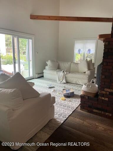 7 Slocum Place Oakhurst, NJ 07755 - Photo 4 of 14 a living room with furniture and a fireplace