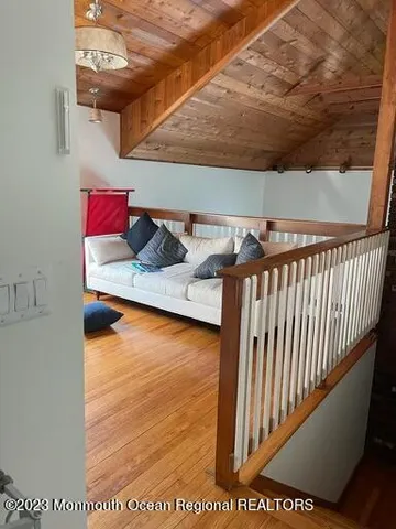 a view of livingroom with furniture and wooden floor