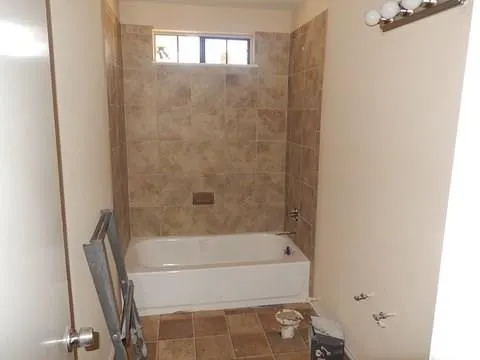 a bathroom with a bathtub