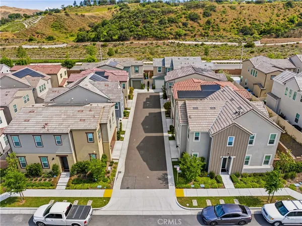 an aerial view of a house with a ocean view