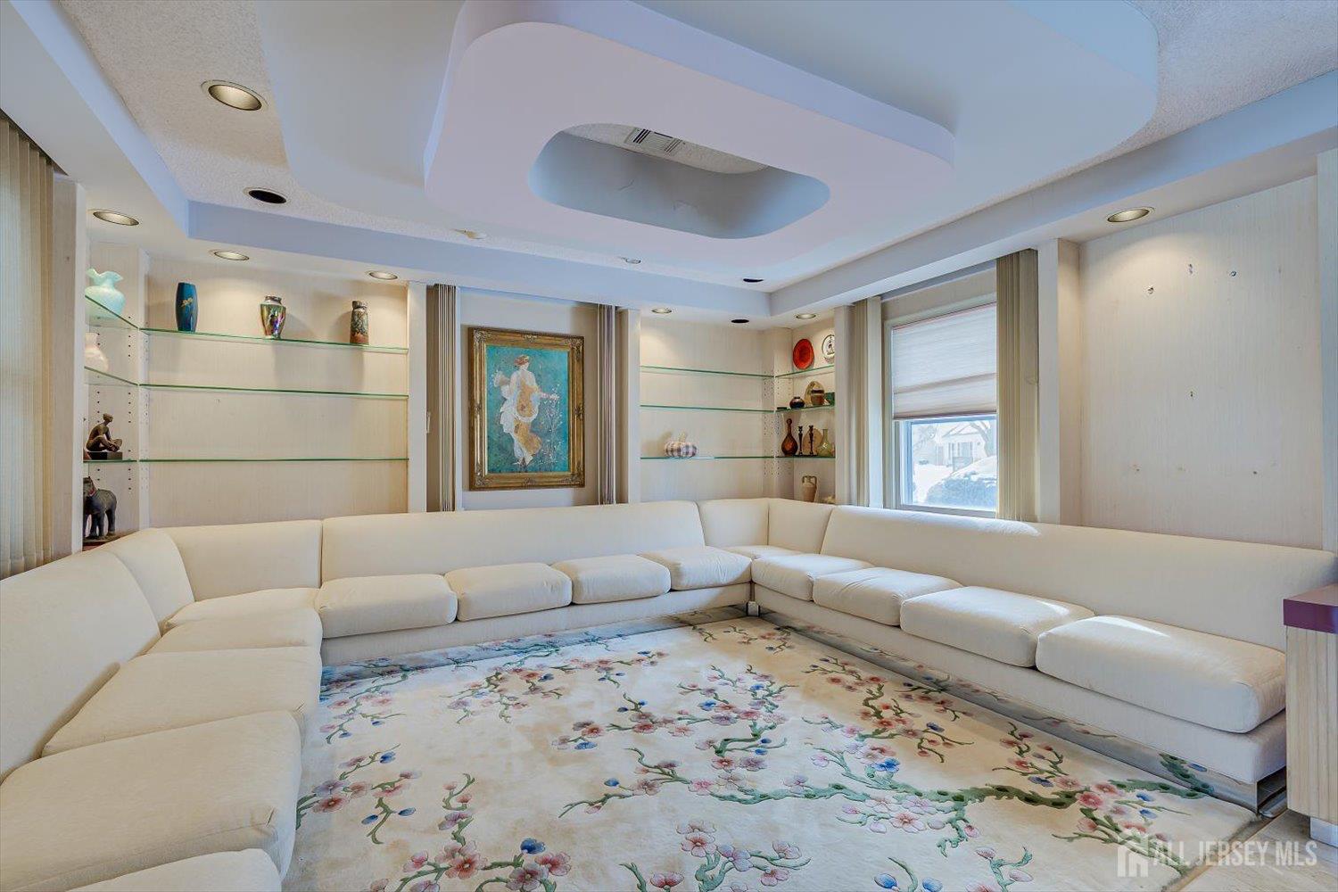 628A Windsor Way, Unit B Monroe Township, NJ 08831 - Photo 13 of 50 a living room with furniture and a couch