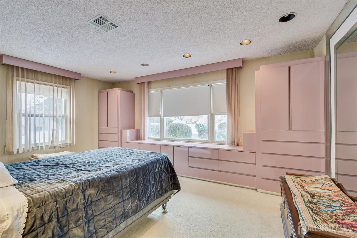 628A Windsor Way, Unit B Monroe Township, NJ 08831 - Photo 24 of 50 a spacious bedroom with a large bed and a window