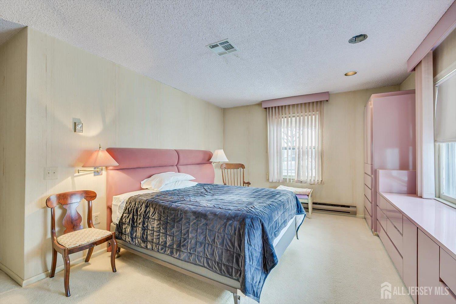 628A Windsor Way, Unit B Monroe Township, NJ 08831 - Photo 25 of 50 a bedroom with a bed and a window