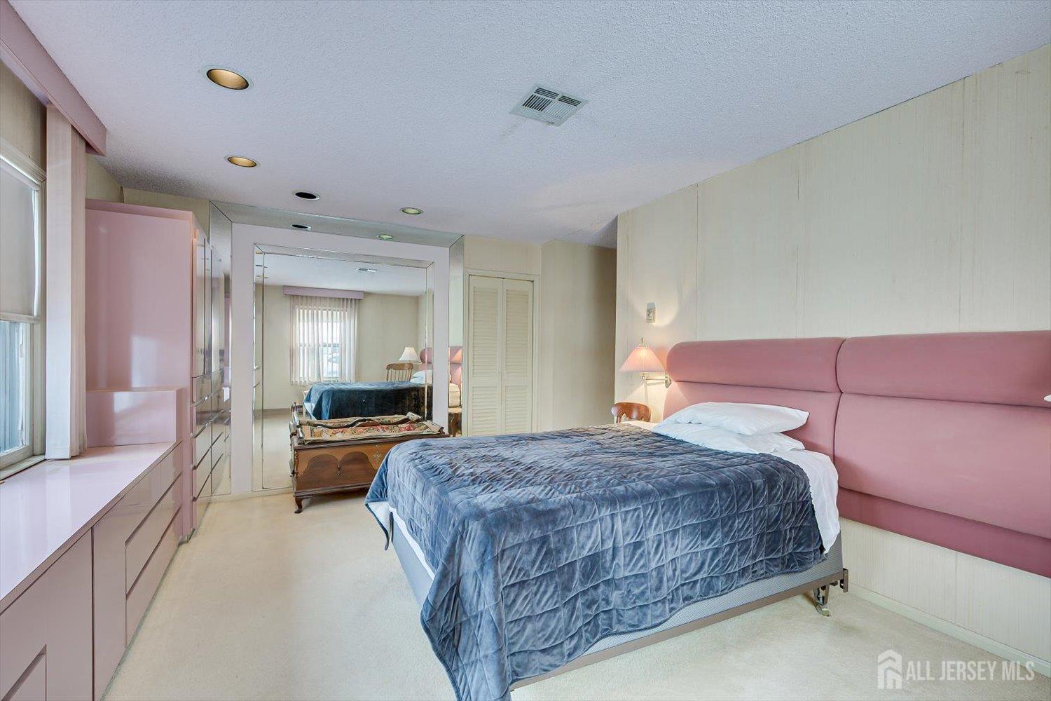 628A Windsor Way, Unit B Monroe Township, NJ 08831 - Photo 26 of 50 a bedroom with bed and a couch