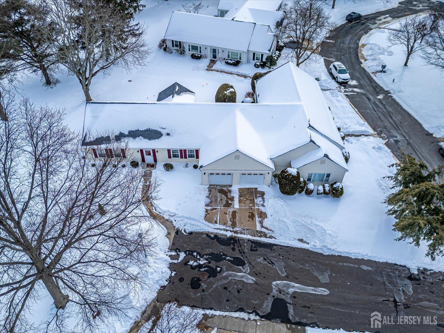 628A Windsor Way, Unit B Monroe Township, NJ 08831 - Photo 37 of 50 an aerial view of a house with a yard