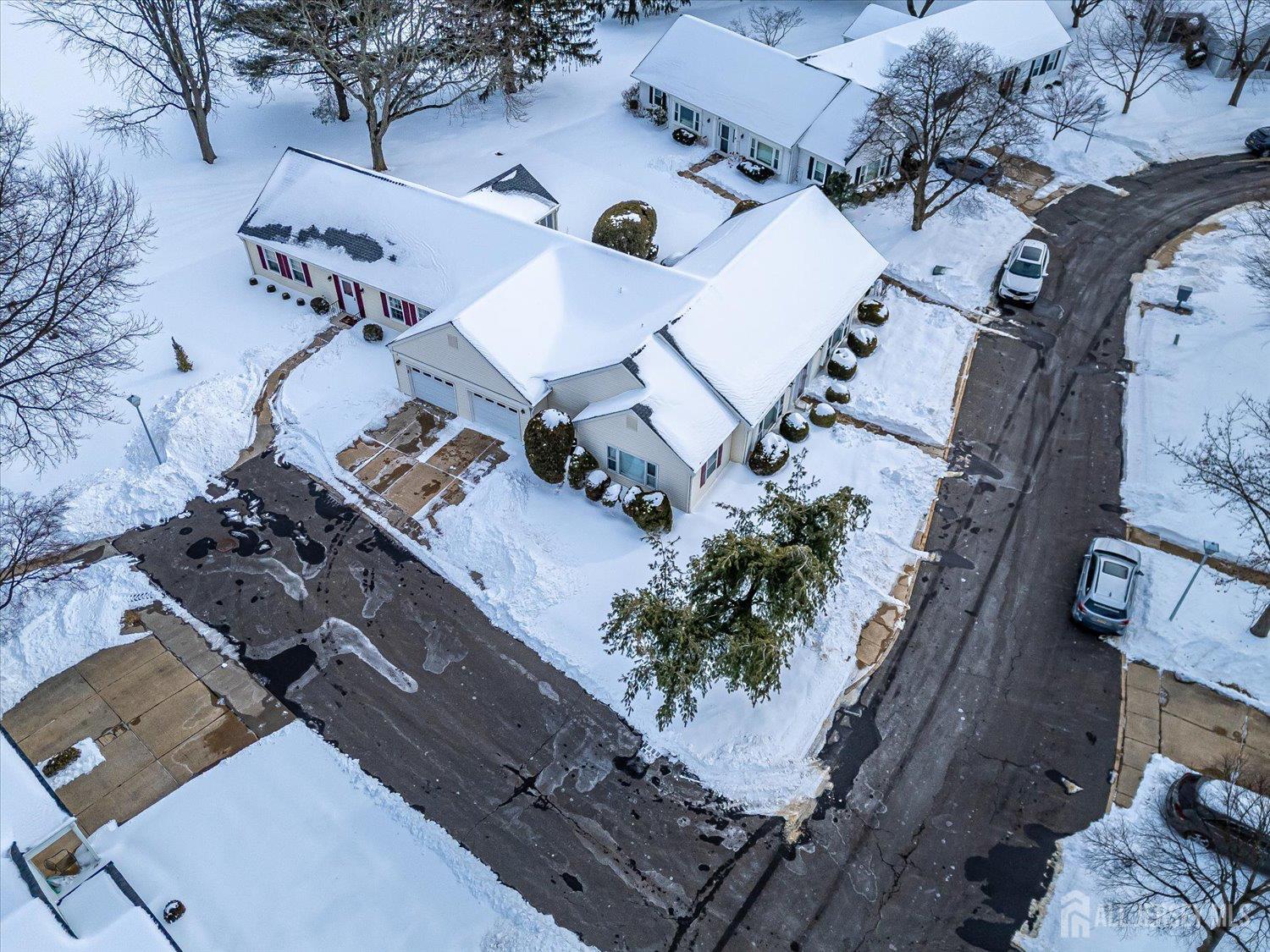 628A Windsor Way, Unit B Monroe Township, NJ 08831 - Photo 39 of 50 an aerial view of a house with a yard