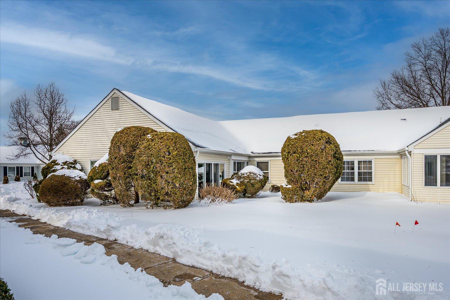 628A Windsor Way, Unit B Monroe Township, NJ 08831 - Photo 4 of 50 a view of a house with a yard