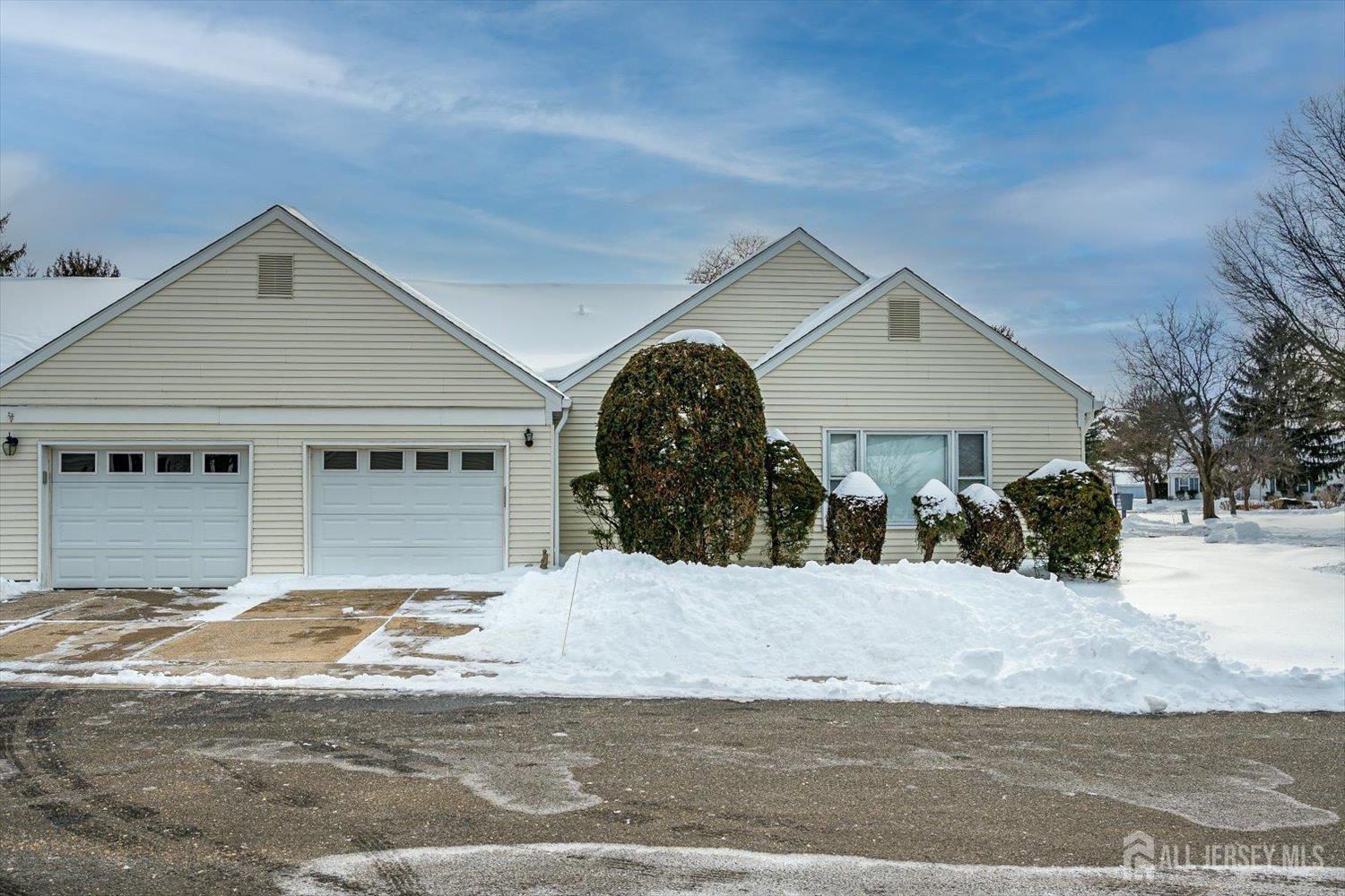 628A Windsor Way, Unit B Monroe Township, NJ 08831 - Photo 5 of 50 a view of a house with a yard